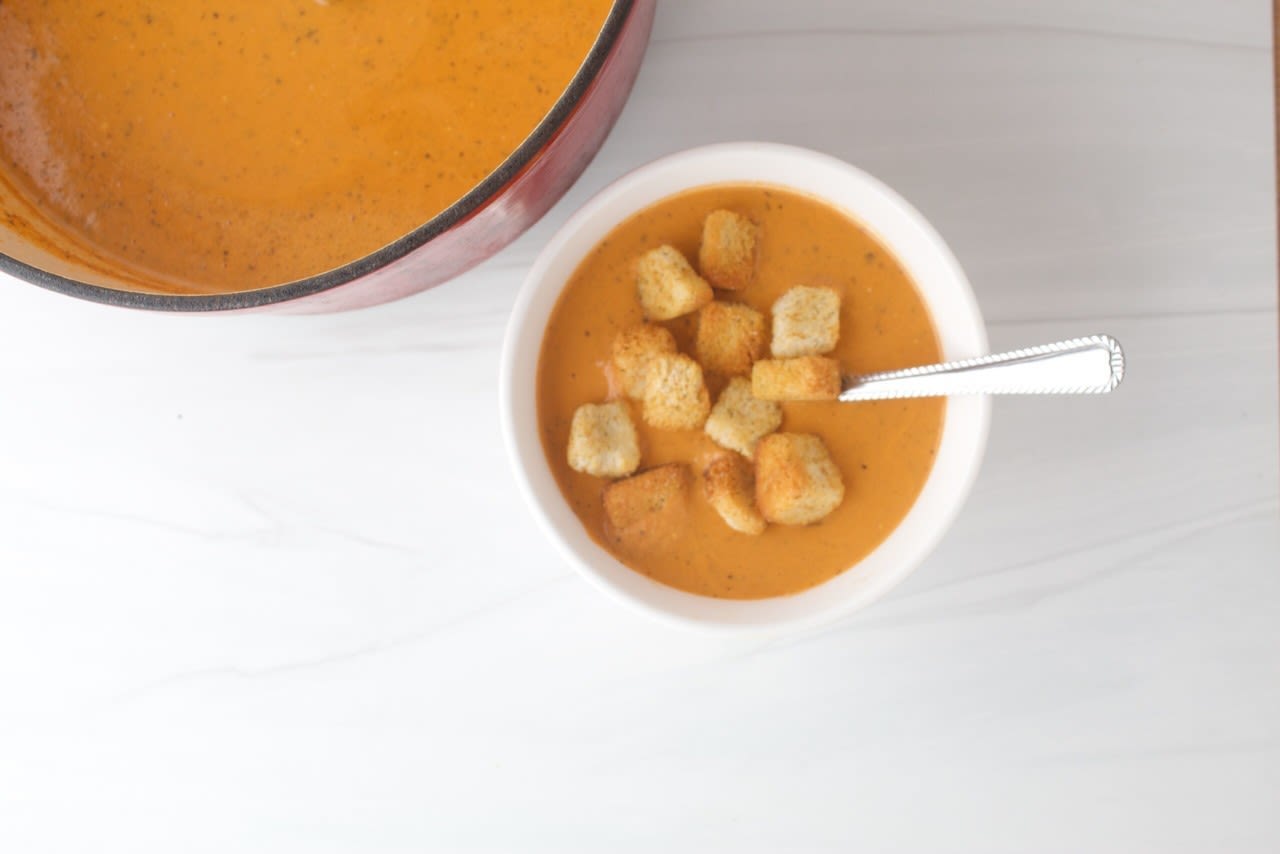 My soup-temper has come in with a late start but late is better than never right? Here is my first soup Simple Tomato Soup with Cream Cheese in Under 30 Minutes. It's creamy without the heaviness, it has a slight tang, and the basil and thyme give it pizza kind of flavor without the guilt.

Simple Tomato Soup with Cream Cheese in Under 30 Minutes

Ingredients 

- 2 tablespoon oil You can use avocado, olive, or vegetable oil.
- 1 medium onion, diced 3-4 garlic cloves, minced 
- 32 oz chicken broth You can use vegetable or beef broth
- 29 oz can whole tomatoes You can use diced tomatoes
- 2 teaspoon dried basil 2 teaspoon ground thyme You can use fresh or dried thyme
- 1 teaspoon salt 
- 2 tablespoon sugar 
- 1 8 oz block of cream cheese

Instructions 

1. In a 3-4 quart pot over medium heat to high heat, add oil, and once the oil is hot, add onions and garlic cloves. Saute for 2-3 minutes until the onion and garlic become translucent. 
2.Once the onions and garlic are done, add chicken broth, whole tomatoes, basil, thyme, salt, and sugar. Bring to a boil and then down to a simmer. 
3. When it's at a simmer, begin to use an immersion blender, and blend until smooth. You can use a blender if you don't have an immersion blender. Place soup in a blender and blend until smooth, then place soup back into the pot. Bring soup to a boil, then down to a simmer for 15-20 minutes. 
4. Add the cream cheese in the last 5 minutes, and blend again with an immersion blender. If using a blender, place about 2 cups of the soup and cream cheese, blend until smooth, and place back into the pot and give it a good mix. Bring soup back to a simmer for 5 more minutes.

#toamtosoup#soup#tomato#simplesoup#weeknightdinncr

Simple Tomato Soup with Cream Cheese in Under 30 Minutes https://semiscratched.com/simple-tomato-soup-with-cream-cheese-in-under-30-minutes/